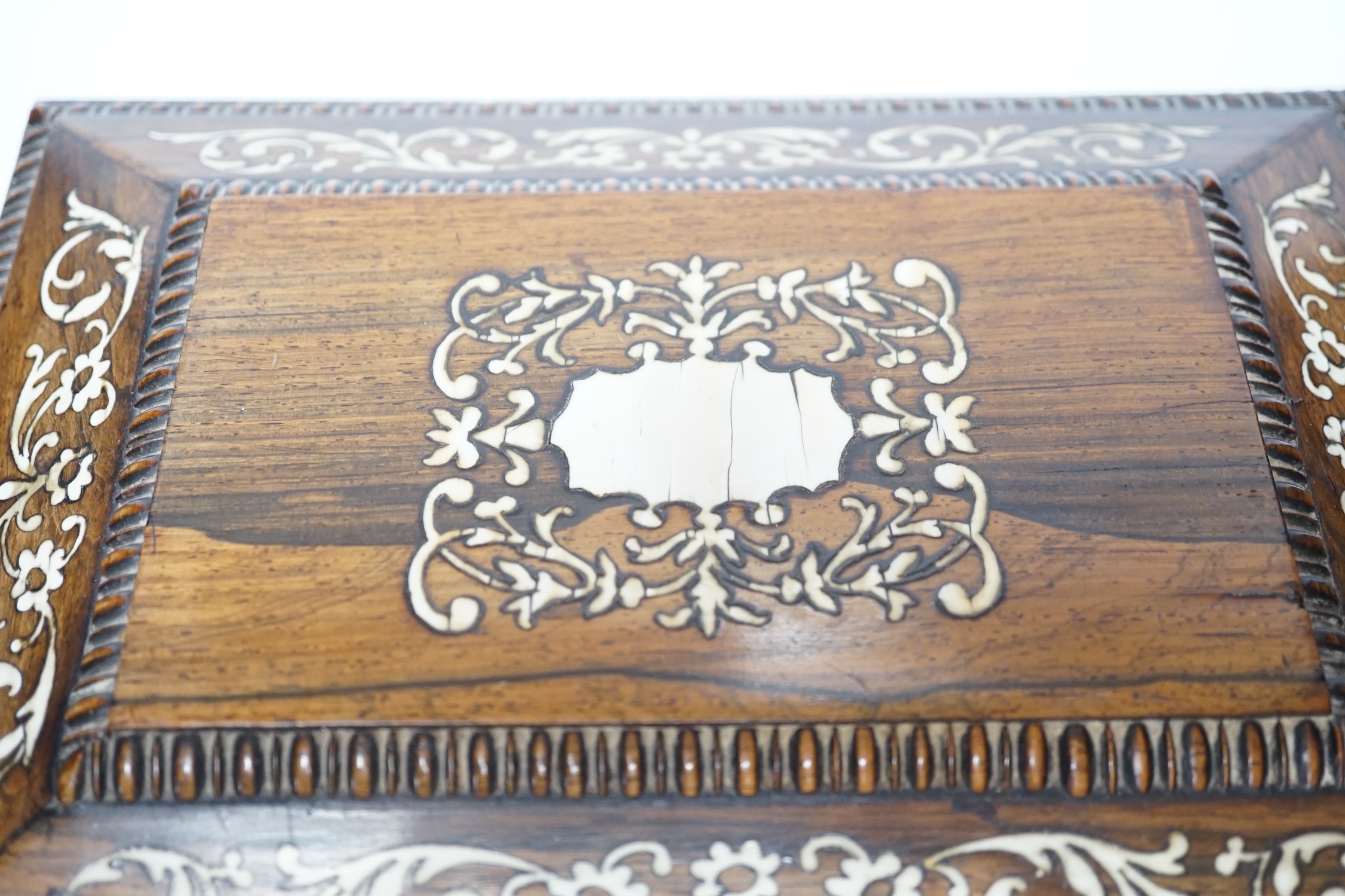 A William IV ivory inlaid rosewood work box, containing a fitted interior with lift out tray, 28.5cm wide, 22cm deep, 14.5cm high CITES Submission reference KBLFMJRS